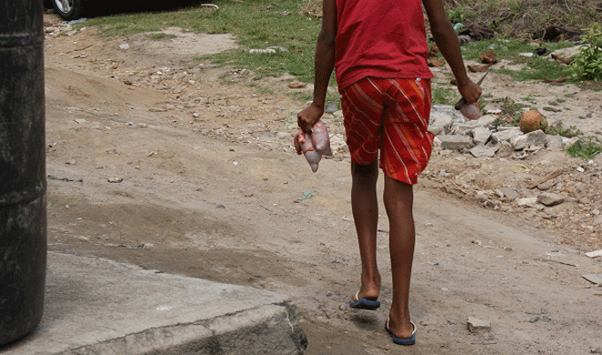 Crianças-do-matadouro-levam-miudos daniel-santini