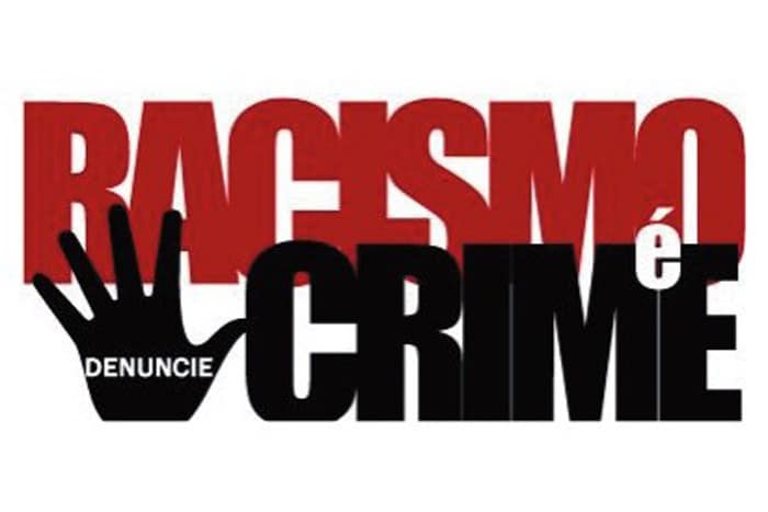 Imagem ilustrativa com a frase 'racismo é crime, denuncie"